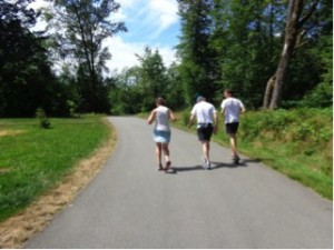 Sheila starting lap 9 with her awesome pacers: her brother and nephew